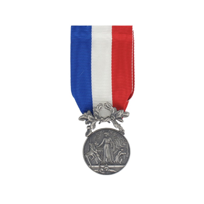 MÉDAILLE -COURAGE ET DÉVOUEMENT